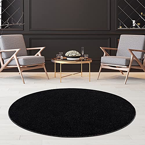 Fashion4Home Alfombra de salón - Alfombra monocromática para habitación infantil, dormitorio, estudio, oficina, pasillo y cocina - Alfombra de pelo corto antracita y negro, tamaño: 120 cm redonda Cover
