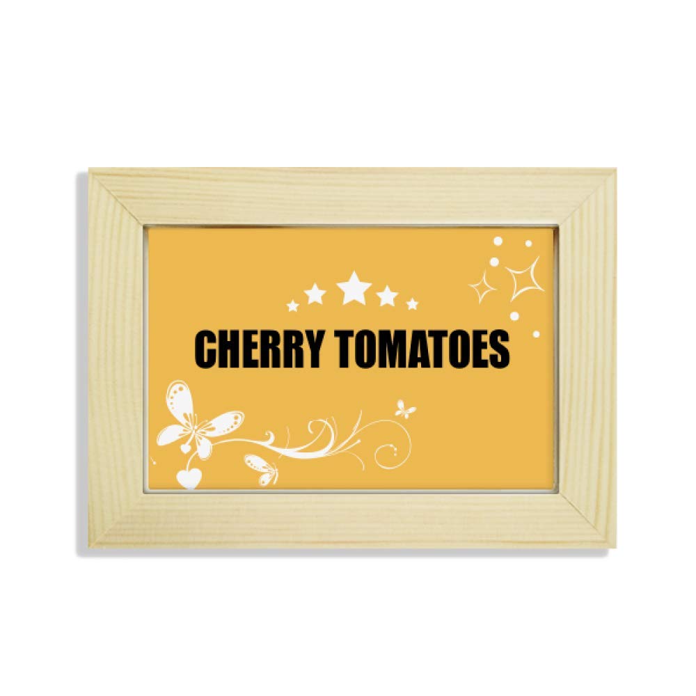Marco de madera y pintura de tomates cereza para dar vida a escritorios apagados