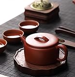 FINITION SOIGNÉE: Couleur terre cuite naturelle avec une texture lisse et mate, témoignant d'un artisanat de qualité