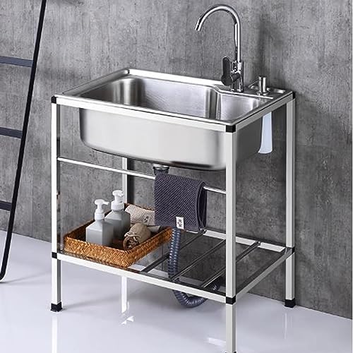Évier de cuisine en inox avec eau froide et chaude et rangement intégré