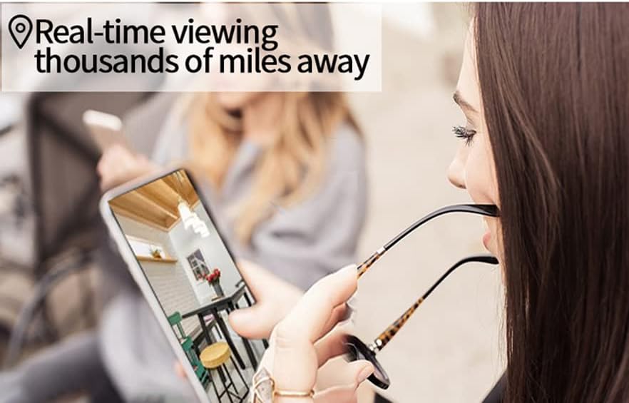 Person viewing camera feed on a smartphone