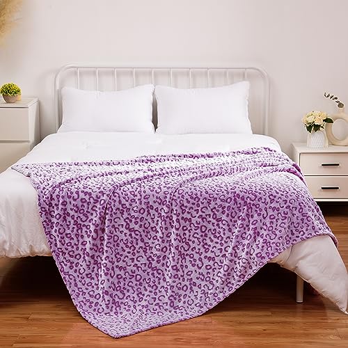 Couverture en flanelle polaire léopard pour vos soirées canapé