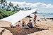 Neso Grande Portable Beach Tent Sun Shelter - Lightweight Beach Shade Canopy - Easy Setup for Family Outings - Patented Reinforced Corners - UPF 50+ Sun Protection - 7ft Tall, 9 x 9ft - White