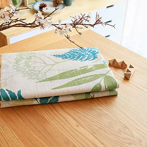 Nappe fleur brodée rectangulaire jaune clair contre table terne - 2