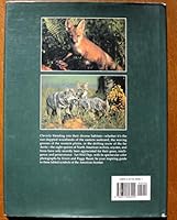 Wild Dogs: The Wolves, Coyotes, and Foxes of North America