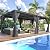 MELLCOM Louvered Pergola 12x24, Aluminum Pergola with Adjustable Louvered Roof, Outdoor Pergola with Waterproof Curtains and Nets, Dark Grey