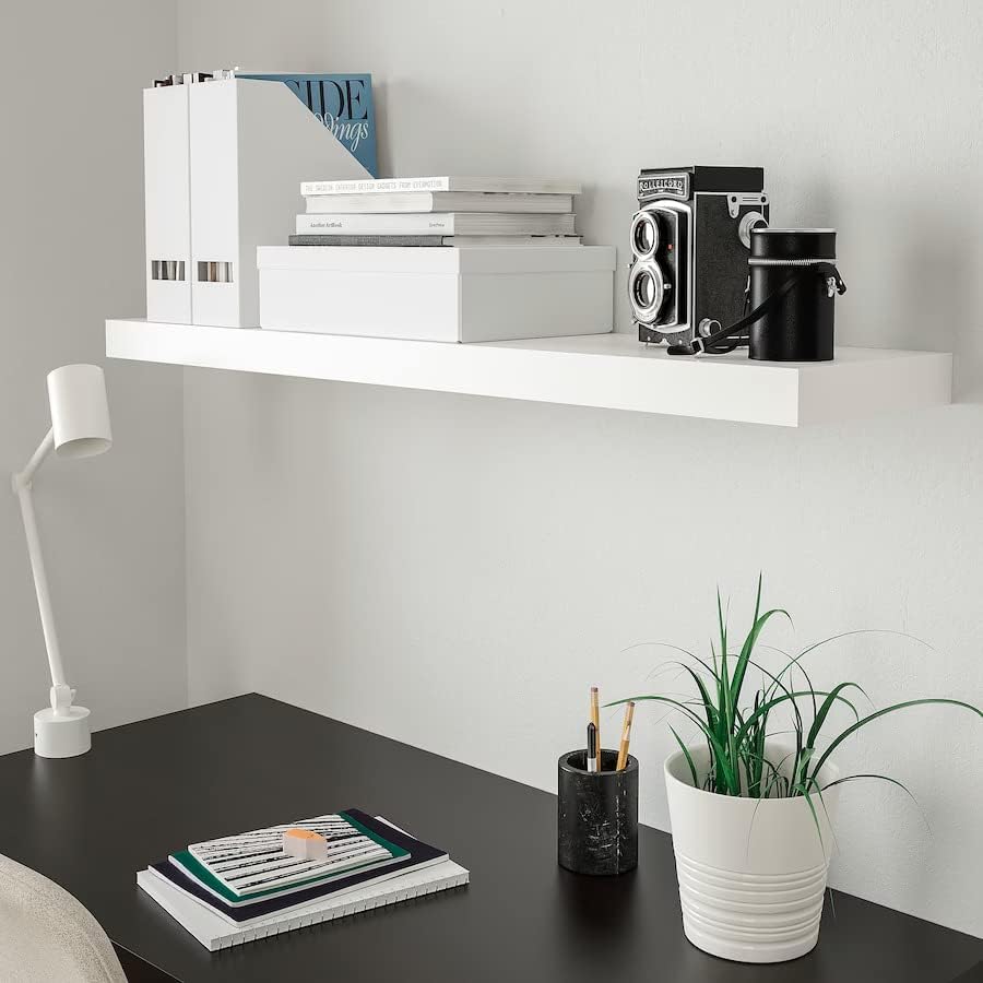 IKEA LACK shelf used as a desk shelf with books and office supplies