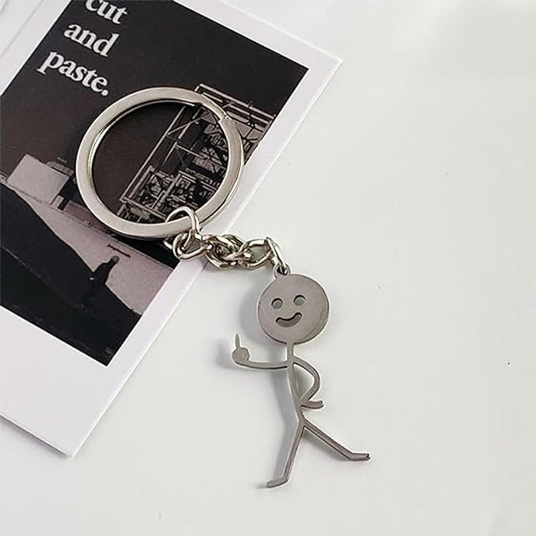 Dreamtimes Lingua dei Segni Fianchi incrociati e faccia pizzicata omino Divertente Portachiavi Persone Piccole Borsa Ciondolo Chiave Auto Coppia Portachiavi Regalo (argento