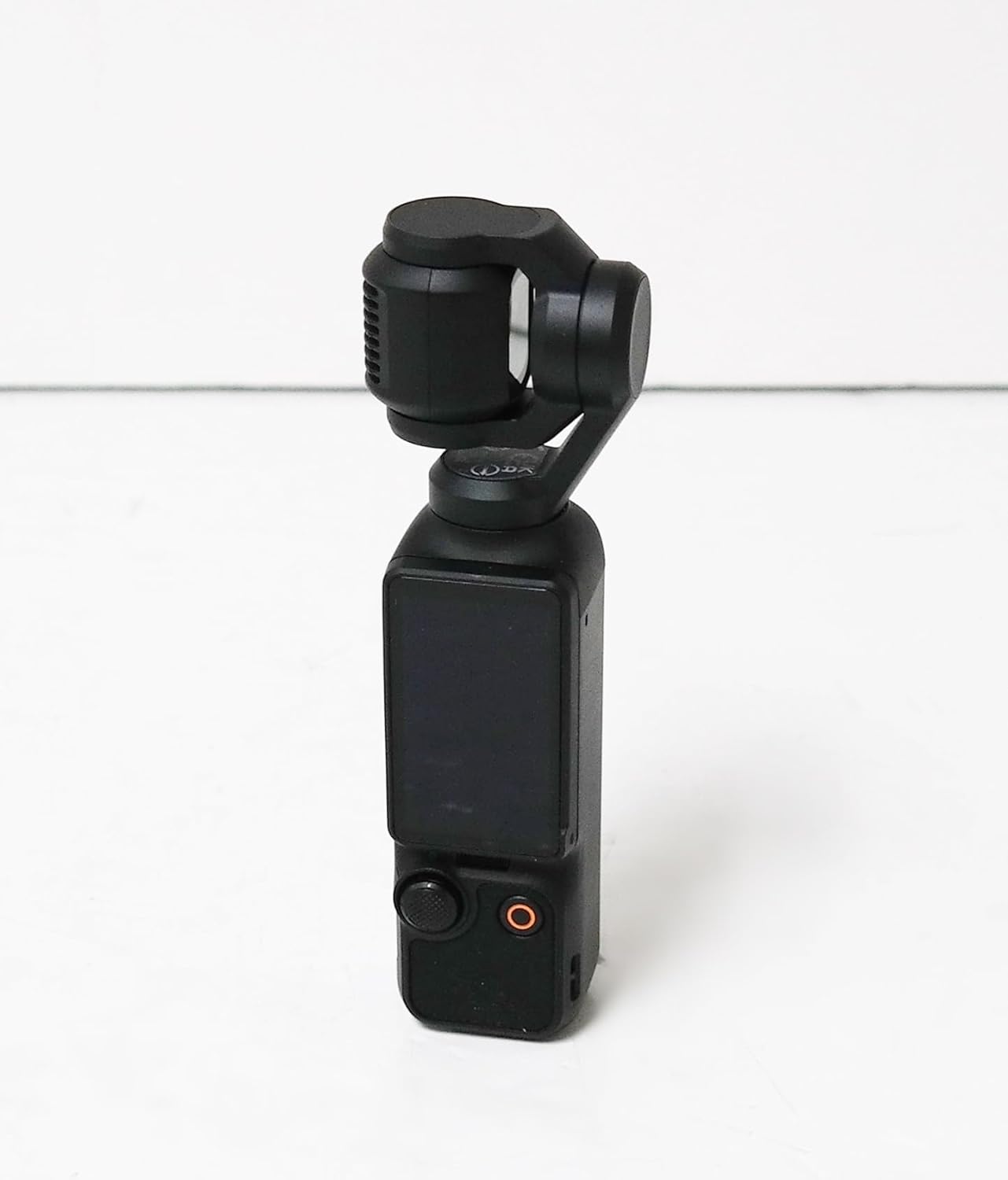 DJI Osmo Pocket 3 with wide-angle lens attached