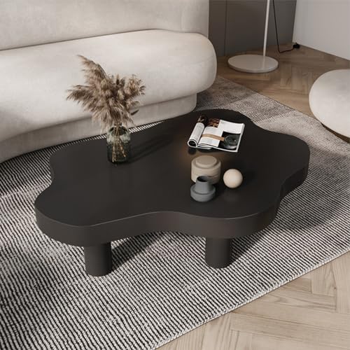 Table basse d'angle ronde en bois pour optimiser les petits salons encombrés