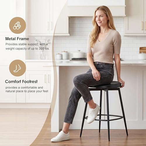 Image of 25 inch Swivel Backless Saddle Bar Stools Set of 4, Black | Solid Wood Saddle Seat, Metal Legs, Footrests,Swivel, Non-Marking Feet, Kitchen Island