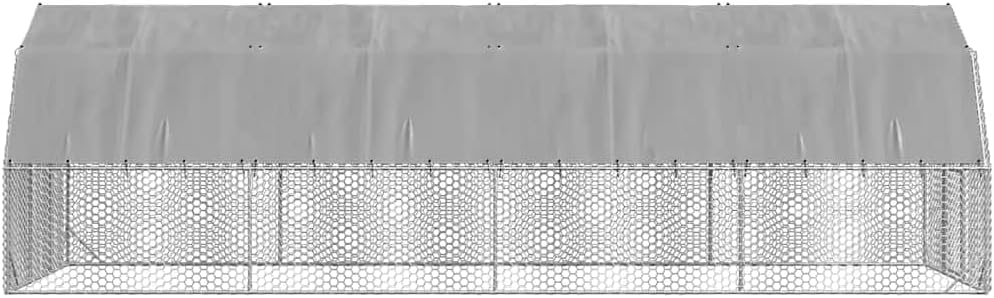 من أعلى إلى أسفل view of the chicken run with the weatherproof cover installed