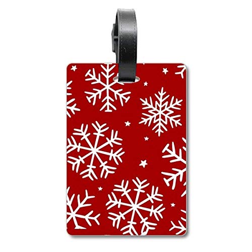Étiquette de valise rouge au motif flocon idéale pour vos vacances au ski