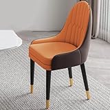 Eleganti sedie da pranzo imbottite: queste sedie da pranzo contemporanee vantano robuste strutture in ferro, sedili in lattice peluche e schienali in pelle, offrendo un comfort eccezionale sia per i pasti che per le riunioni sociali.