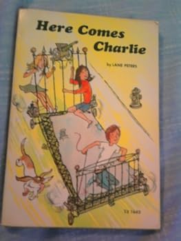 Paperback Here Comes Charlie Book