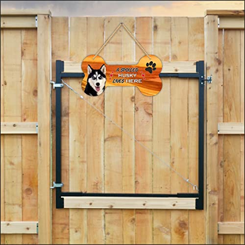 Image of CVANU Laser Cut MDF Wooden Cute Dog Sign Plaque Bone Design A Spoiled Husky Lives Here Animal Love Sign Board, Name Plate for Dog House Black & White, Size(10x5) inch