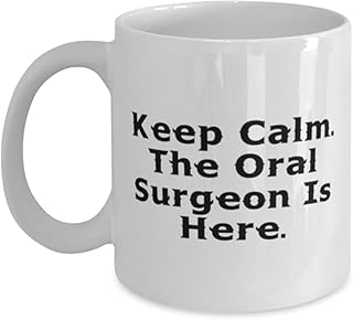 MB10 PROUD GIFTS Keep Calm. The Oral Surgeon Is Here. 11oz 15oz Mug, Oral surgeon Present From Colleagues, Fancy Cup For Colleagues, Dental health, Toothbrush, Toothpaste, Floss, Mouthwash