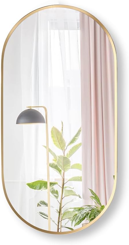 Kohler Essential 20. in. W x 40 in. H Framed Oval Wall Mount Vanity Mirror in Modern Brushed Gold