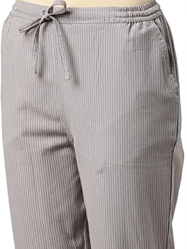 Image of GO COLORS Ikat Print Beige Printed Pencil Pant for Women | Breathable, Side Pocket