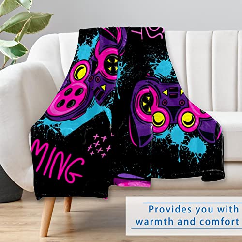 Couverture douce pour frissonner moins devant la console avec motif manette 150x100