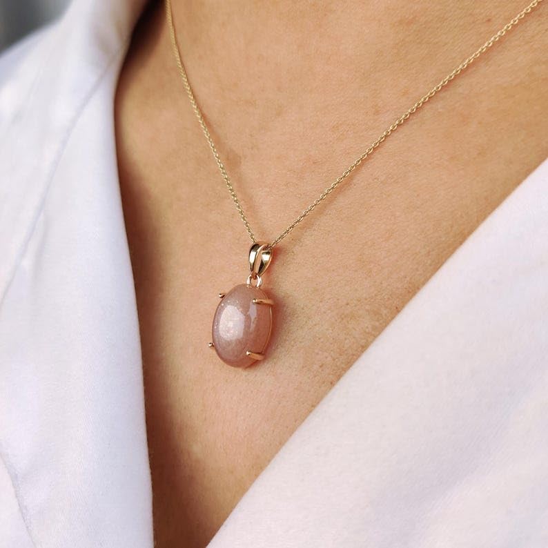 Pendentif pierre de lune pêche LKBEADS pour éveiller votre énergie