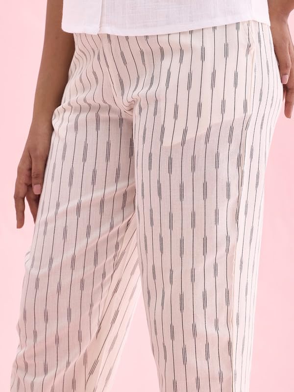Image of GO COLORS Ikat Print Beige Printed Pencil Pant for Women | Breathable, Side Pocket