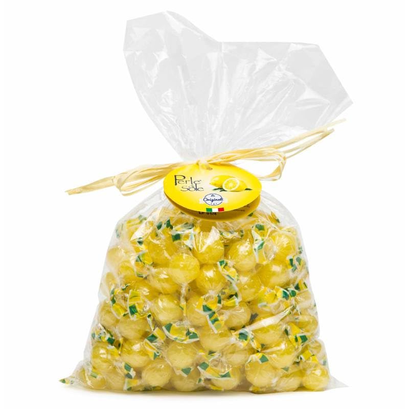 Perle di Sole Twarde cukierki o smaku cytrynowym 1000 g wypełnione musującym proszkiem.