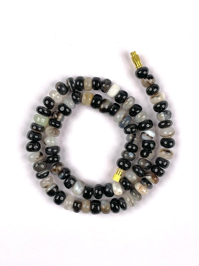 Onyx naturel 8mm perles rondes lisses pour façonner un bijou chargé d'histoire