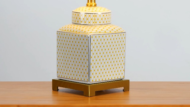 Image of JONATHAN Y Cleo 21.5 inch Yellow & White Ceramic Table Lamp with Brass Base