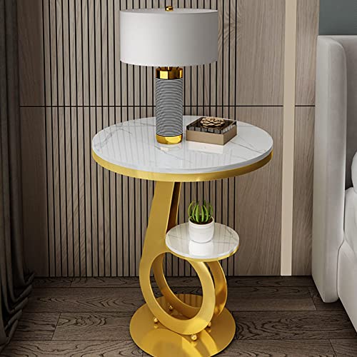 Table basse ronde dorée en métal au design moderne de salon