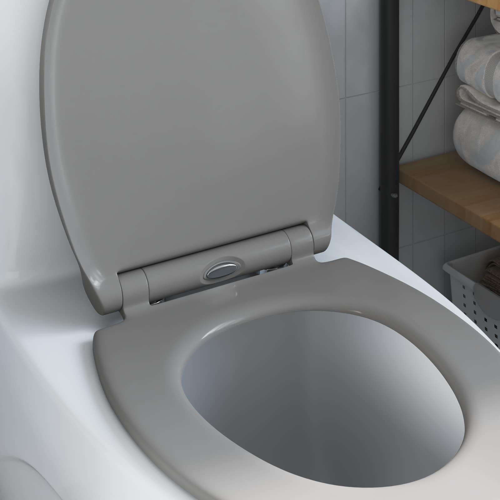Sedile WC moderno in polipropilene grigio 47 x 37,5 x 3,8 cm, dal design sobrio e di facile montaggio per bagni interni.