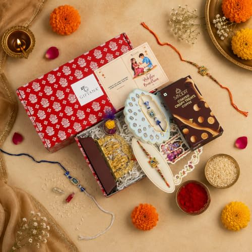 Image of Giftana Rakhi Gift Set for Brother & Bhabhi, Radha Krishna Rakhi, Evil Eye Rakhi, Ganesh Ji & Laxmi Ji Idol, Greeting Card Set, Raksha Bandhan Gift Combo for Bhaiya Bhabhi