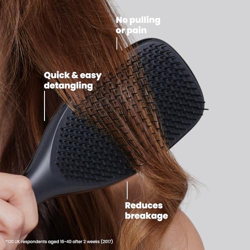 Image of Tangle Teezer Large Ultimate Detangler Brush, Straight to Wavy Hair, Black | Hairbrush with patented two-tier teeth & a 20% larger paddle detangles & reduces breakage on straight to wavy hair