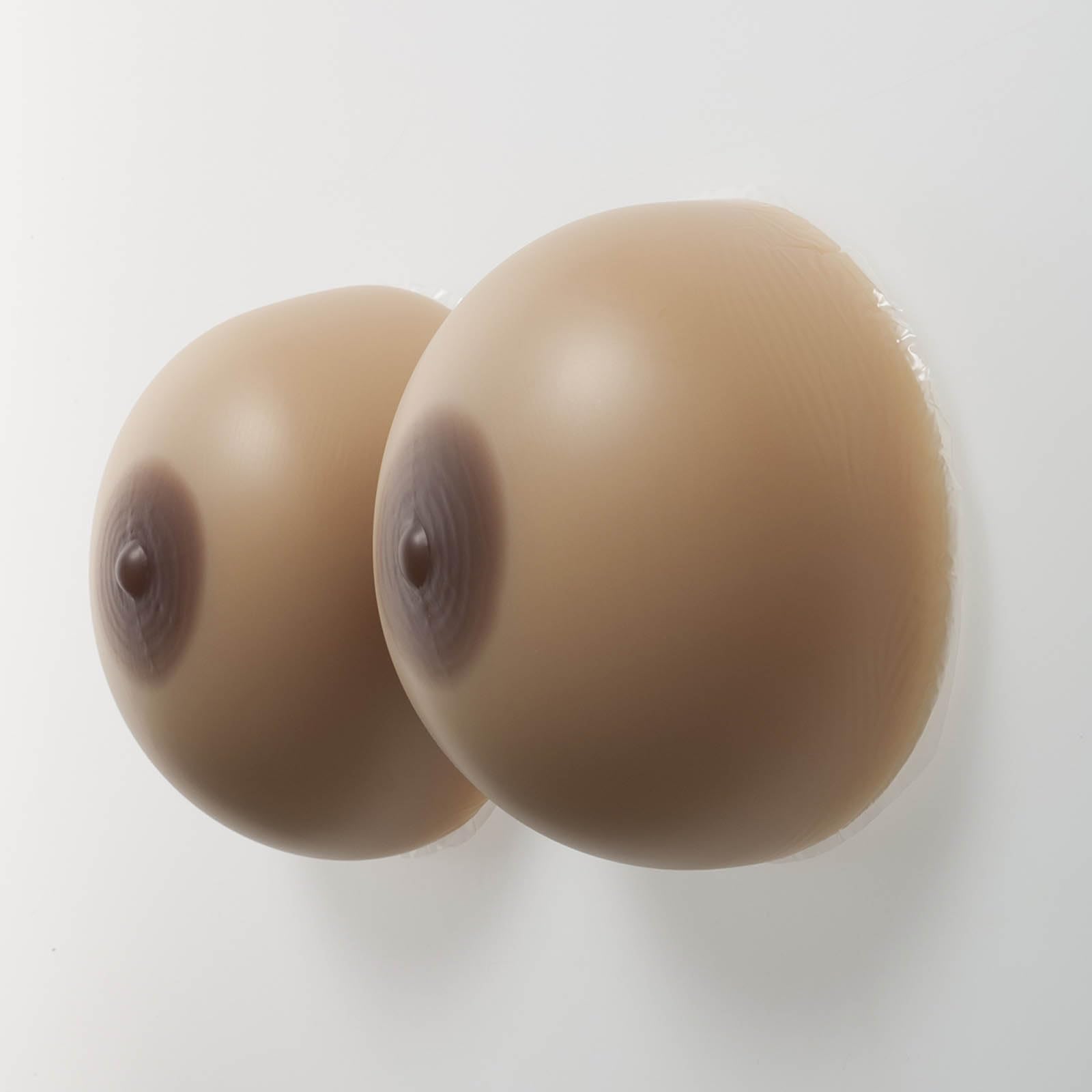 Coussinets d'allaitement en silicone Tan Skin – Formes rondes ultra-douces pour mastectomie, transgenres et cosplay – Ajustement confortable et lift naturel – Teint mat (XL)