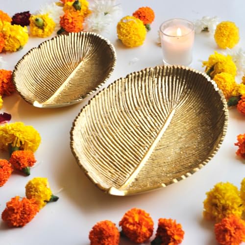 Image of BEHOMA Metal Leaf Shape Tray, 11 & 8 inch, Set of 2 | Set of 2 golden leaf-shape metal trays, 11 inch & 8 inch; perfect for haldi, mehendi & Navratri decor.