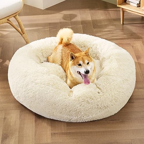 Image of Bedsure Calming Dog Bed for Medium Dogs - Donut Washable Medium Pet Bed, Anti-Slip Round Fluffy Plush Faux Fur Cat Bed, Fits up to 45 lbs Pets, Ivory Beige, 30 inches