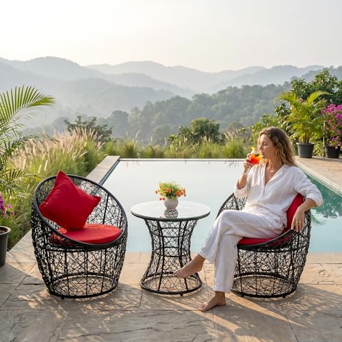 Image of OUTLIVING Outdoor Two Seater Rattan & Wicker Conversation Mudda Set | UV & Water Resistant Patio & Garden Furniture Set with 4 Cushion, 2 Chairs & Center Table with Glass Top| Black & Red