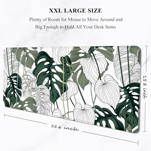 Image of Auhoahsil Desk Mouse Pad, Large Gaming Mousepad, XXL Desk Pad, Extended Long Superior Micro-Weave Cloth Non-Slip Rubber Big Computer Mouse Mat for Gamer, Office & Home, 35 inch x 15 inch, Abstract Monstera