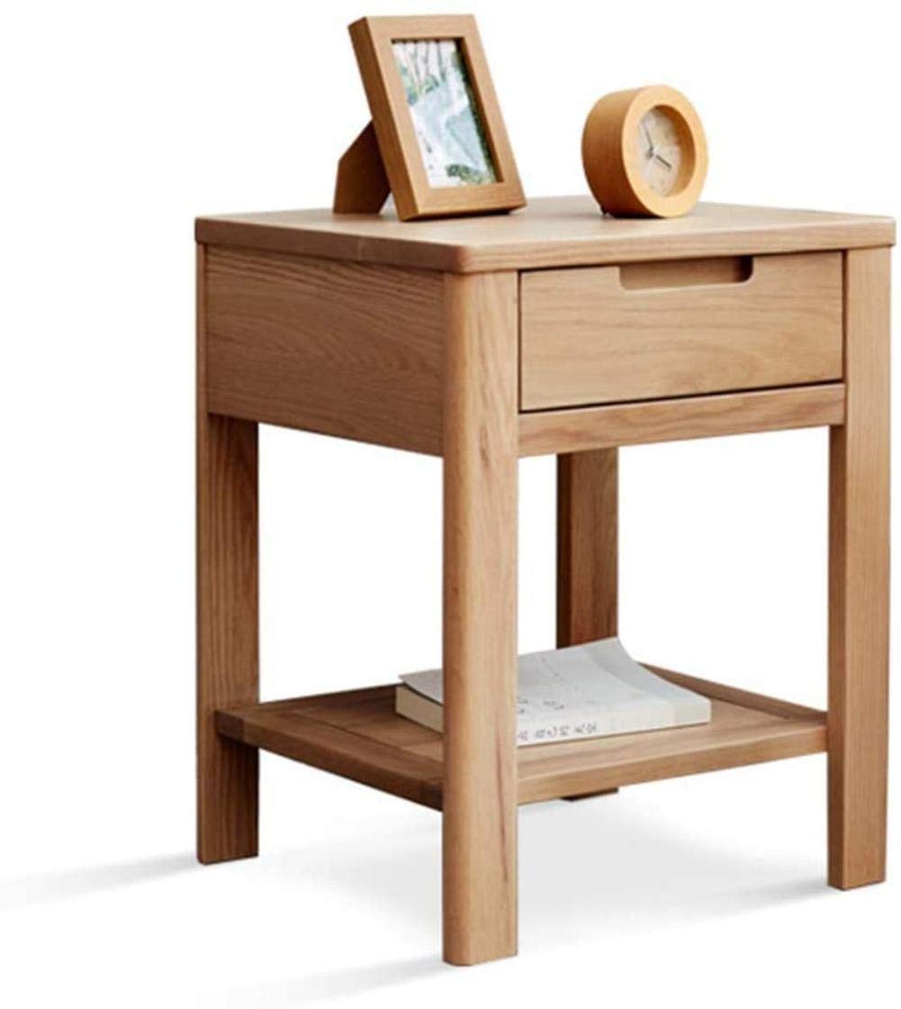 Table d'appoint à deux tiroirs pour optimiser le rangement du salon
