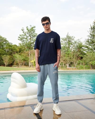 Image of Bewakoof Men's Graphic Printed 100% Cotton T-Shirt - Oversized Fit, Round Neck, Half Sleeves