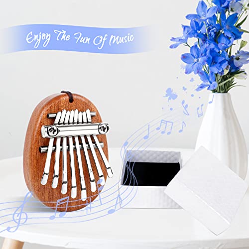 Kalimba 1 Pcs 8 Touches Clés Kalimba Piano de Poche Portable Mini Piano à Pouce Instrument de Musique pour Enfants… - Les Beatles, Paul McCartney, John Lennon, RIngo Starr, George Harrison Kalimba 1 Pcs 8 Touches Clés Kalimba Piano de Poche Portable Mini Piano à Pouce Instrument de Musique pour Enfants… – Image 6
