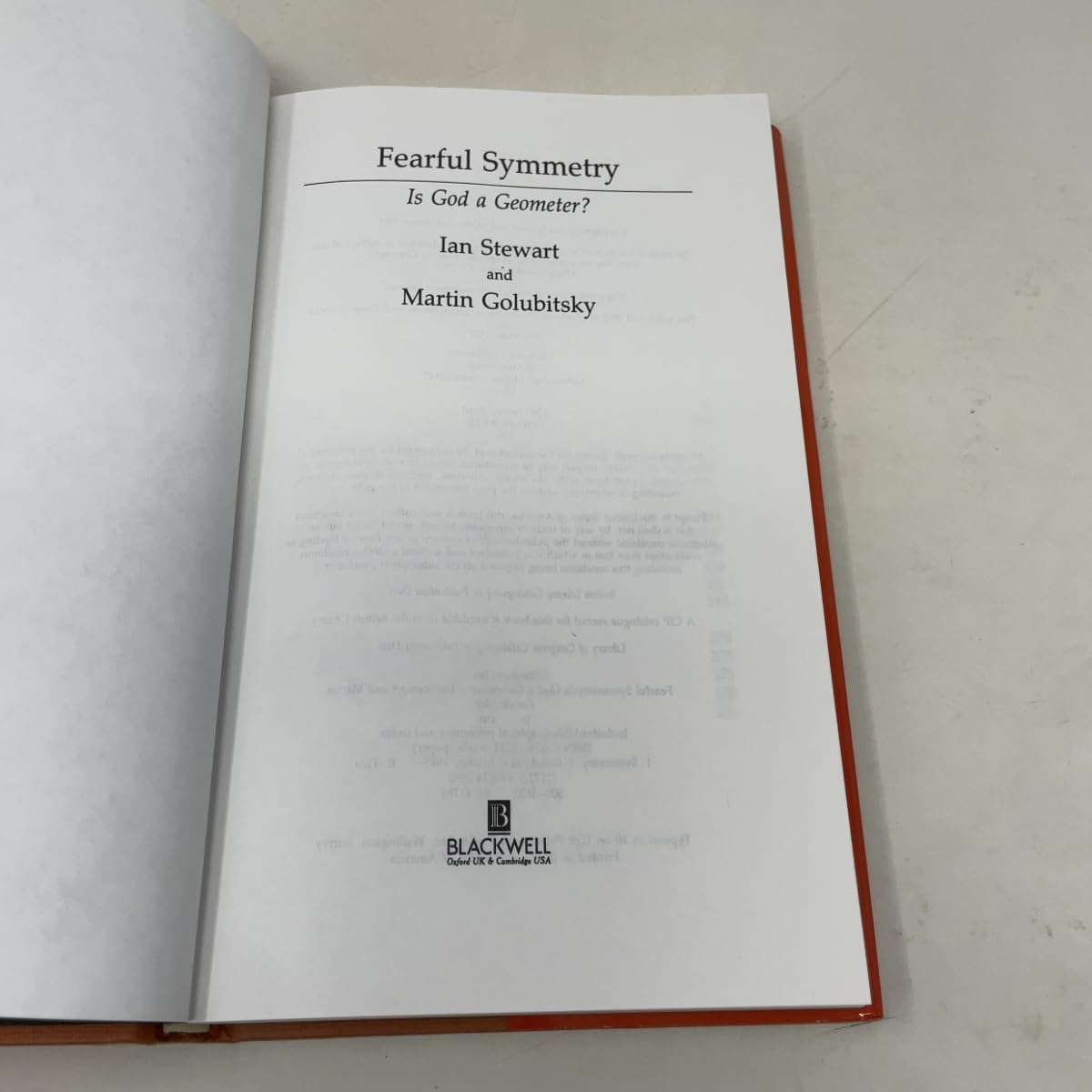 Fearful Symmetry: Is God a Geometer? Stewart, Ian and Golubitsky, Martin - PT02