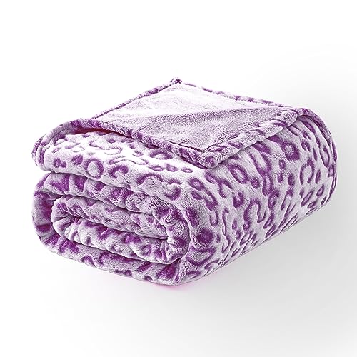 Couverture en flanelle polaire léopard pour vos soirées canapé