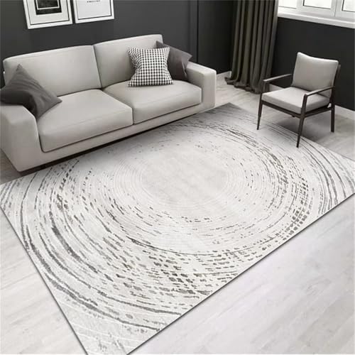 Chambre ado chaleureuse avec un petit canapé tapis gris antidérapant