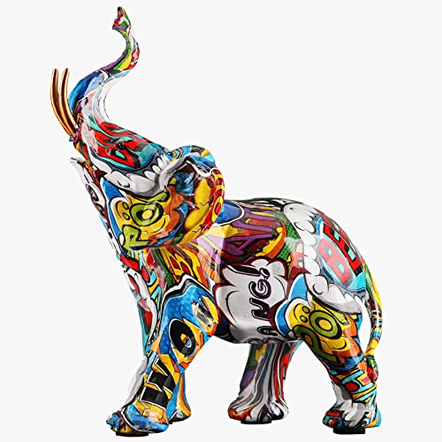 Elefante con tronco verso l'alto: la soluzione ideale per creare la propria arte unica. Se siete alla ricerca di un modo per aggiungere un po 'di colore alla vostra scrivania, queste sculture colorate di elefante graffiti dall'Africa sono un'ottima soluzione. Queste statue sono di dimensioni perfette, rendendole perfette per qualsiasi casa, ufficio o negozio