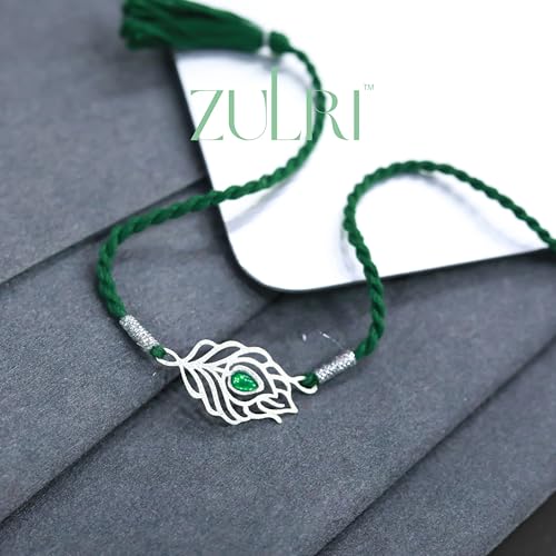 Image of 925 Sterling Silver Peacock Feather with Green Stone Rakhi for Bhai Cotton Thread | Rakshabandhan Rakhi With Greeting Card & Roli Chawal and Certificate of Authenticity