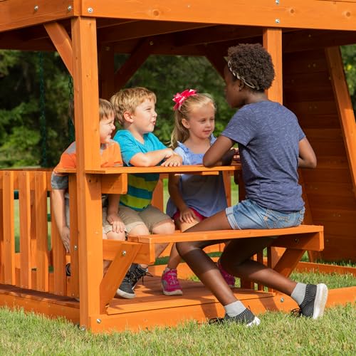 Image of Backyard Discovery Skyfort II Cedar Wood Swing Set with Wave Slide, Raised Clubhouse, Crow's Nest, Monkey Bars, Balcony, Belt Swings, Trapeze, Rock Wall, Picnic Table, Sandbox, Ladder, Outdoor Playset
