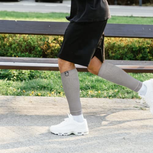 Image of KUE Compression calf sleeves for men and women | Running, Sports Activity | Improved Blood Circulation, Swelling, Calf Support in Muscle Fatigue & Recovery (Grey, S /M)