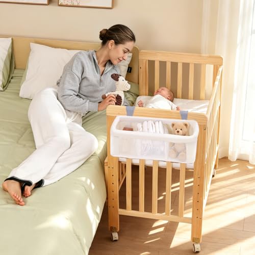 Wood Baby Bassinets Bedside Sleeper Portable 3-in-1 Baby Bassinet with Breathable Mattress 6 Heights Baby Crib with Storage Basket Mini Crib with Wheels for Infant Newborn and Small Space Natural