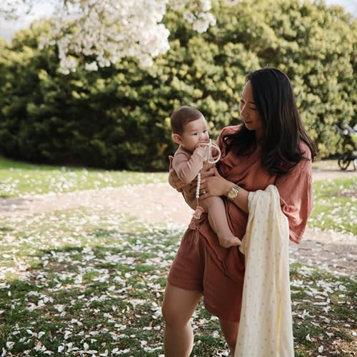 Image of mushie Muslin Baby Swaddle Blanket | 100% Organic Cotton (Bows)